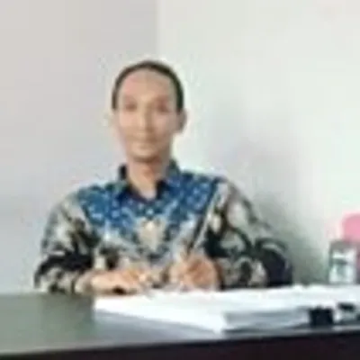 AGUS HUMAIDI, S.H.I., M.H